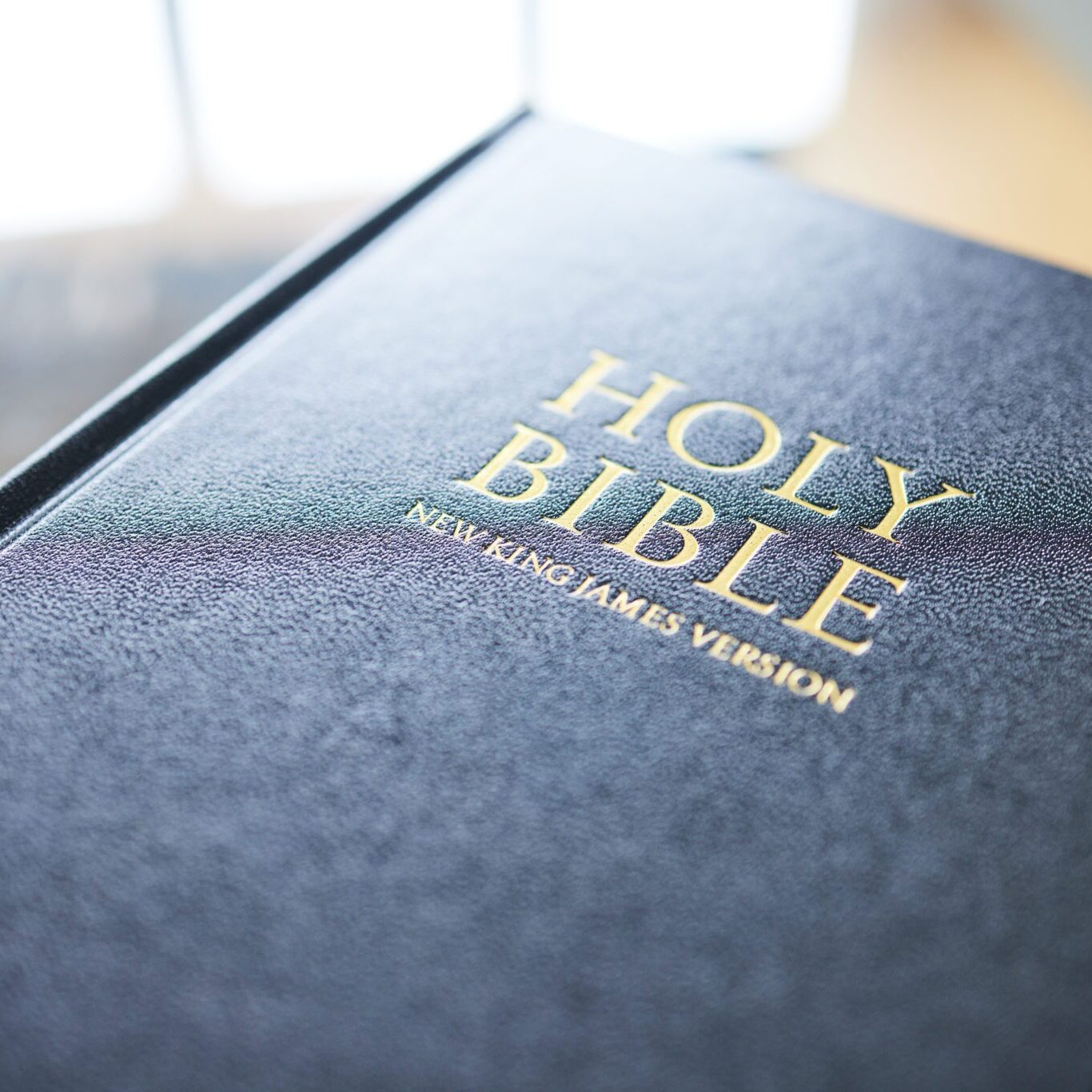 closeup-bible-book-and-home-for-faith-studying-r-2025-04-06-07-06-59-utc Closeup, bible book and home for faith, studying religion and mindfulness with holy spiritual scrip.